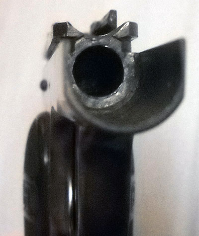 detail, front view of Colt 1903 frame showing mainspring guide channel
